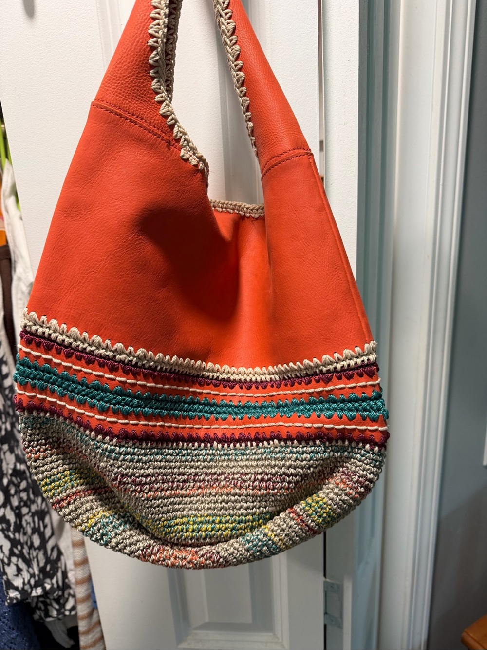 The Sak Orange Leather Hobo with Multicolor Crochet Trim